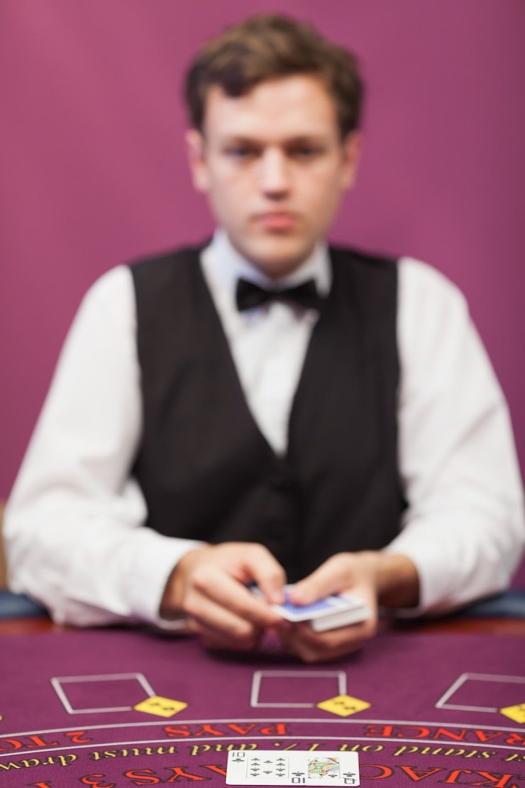 Professional live dealers hosting blackjack and roulette tables at Crickexx