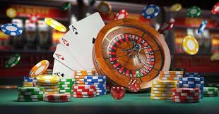 Multiple live dealer game tables including roulette wheel and card games in professional studio setting